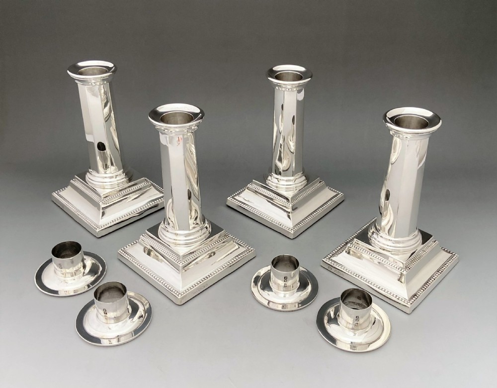 A rare set of four Art Deco silver candlesticks View V