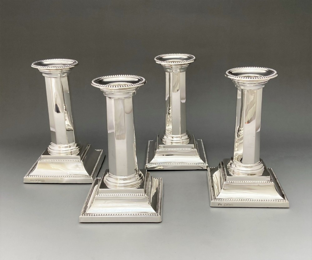 A rare set of four Art Deco silver candlesticks View VI
