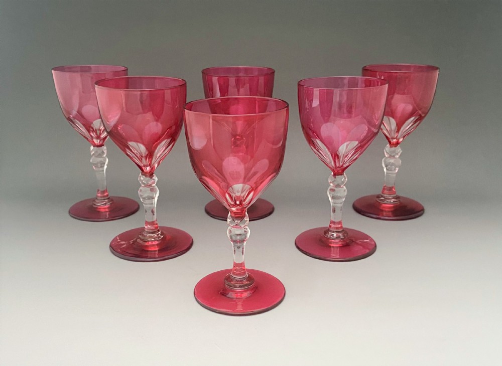 A gorgeous set of 6 Victorian cranberry wine glasses