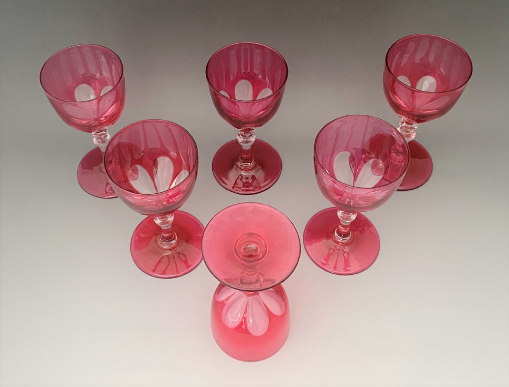 A gorgeous set of 6 Victorian cranberry wine glasses View V