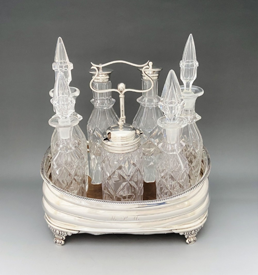 A wonderful Georgian Silver & cut glass table cruet set