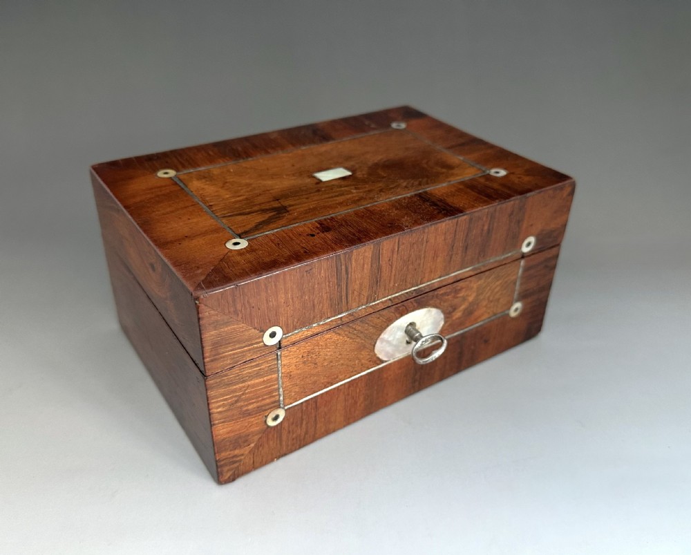 A gorgeous early Victorian rosewood sewing box View II