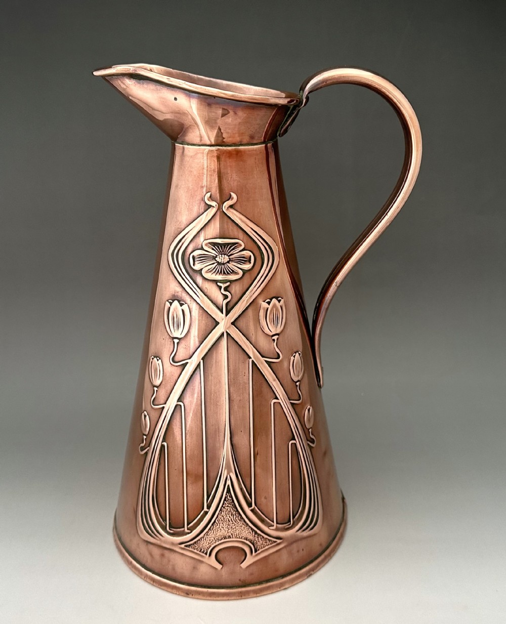 A wonderful Art Nouveau copper jug