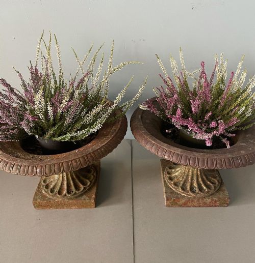 AN ANTIQUE PAIR OF 19THC CAST IRON URNS - ADDITIONAL PHOTO 1