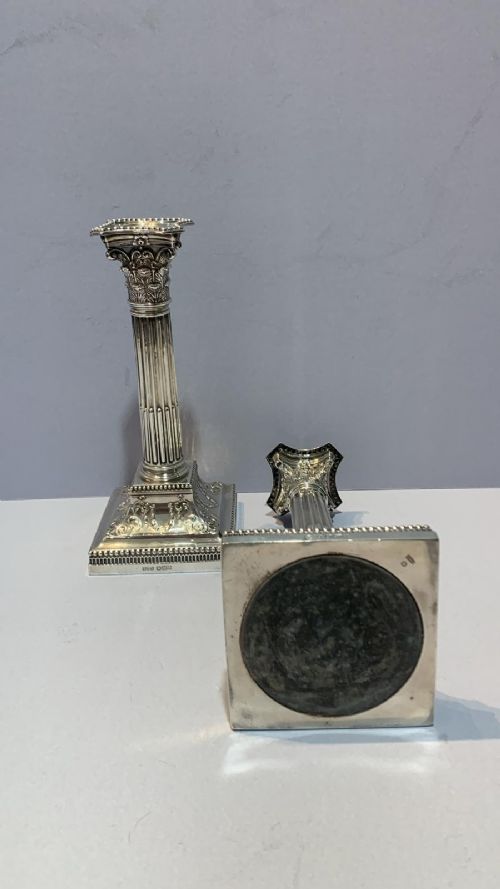 AN ANTIQUE PAIR OF SILVER CANDLESTICKS - ADDITIONAL PHOTO 2