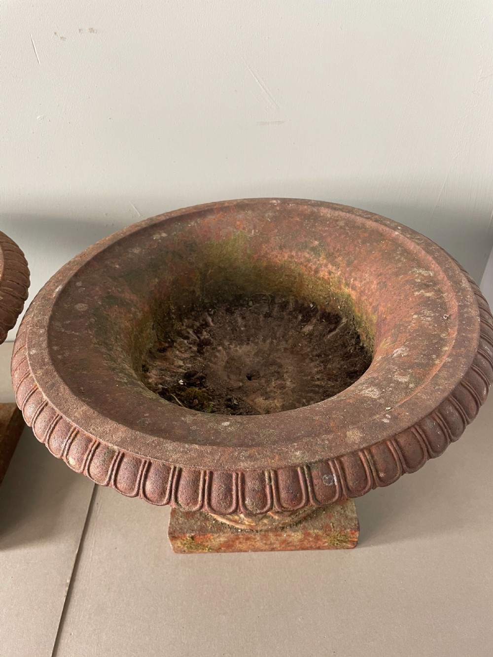 An Antique pair of 19thC cast iron urns View VI