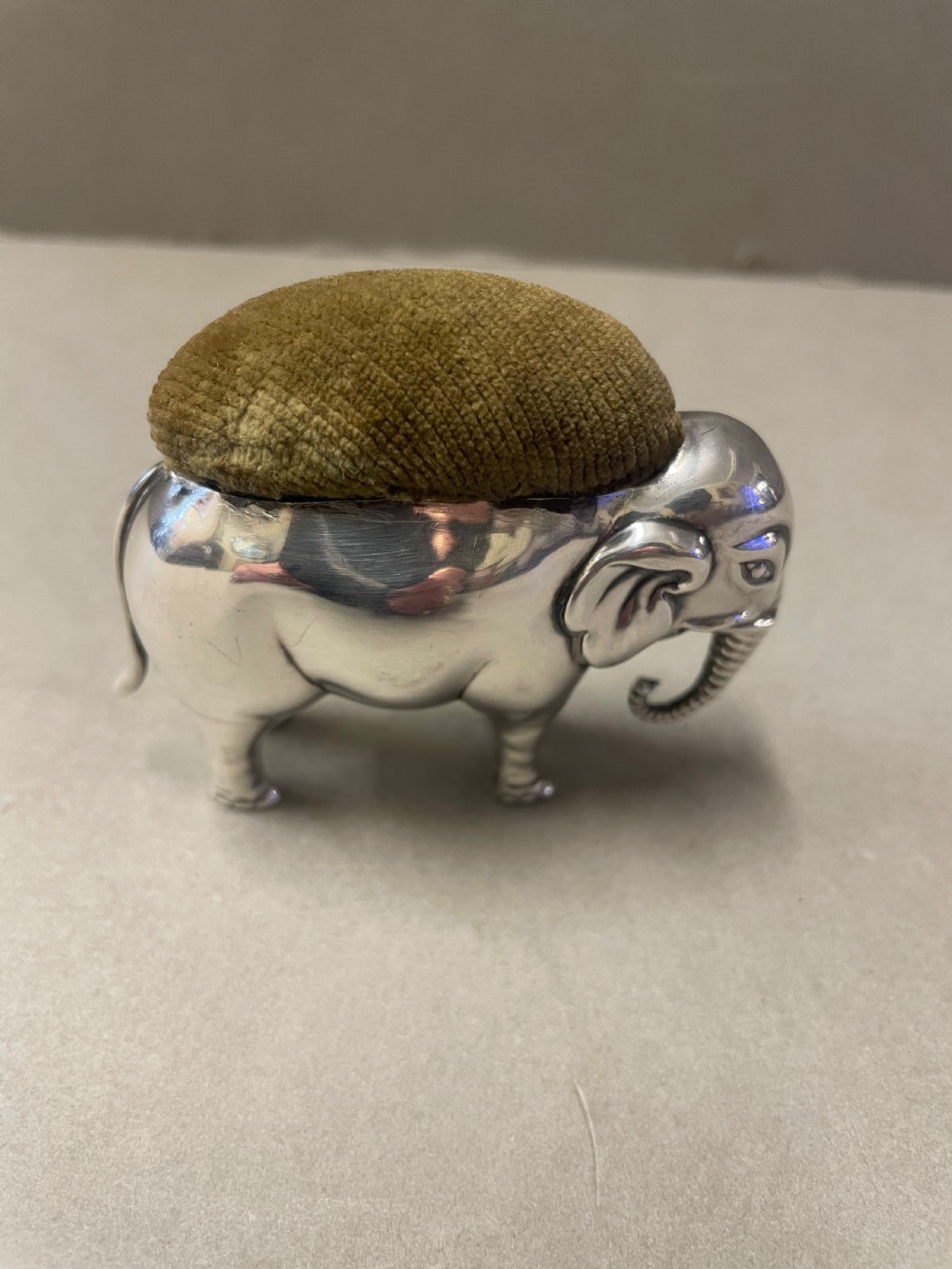 An Antique Silver Elephant Pin Cushion View V