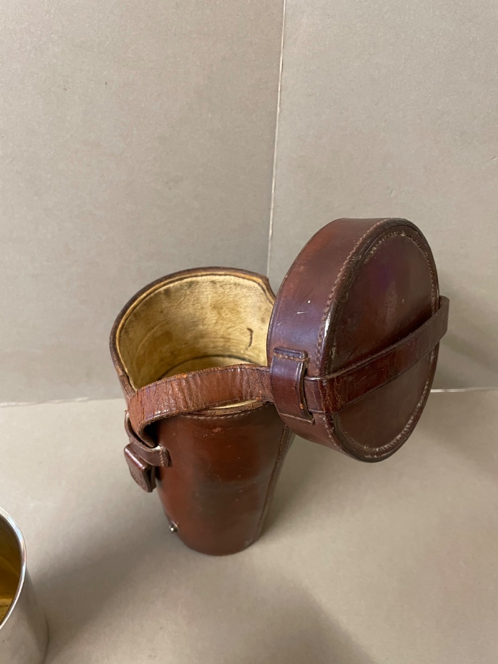 An Antique  hunting flask and four cups View V