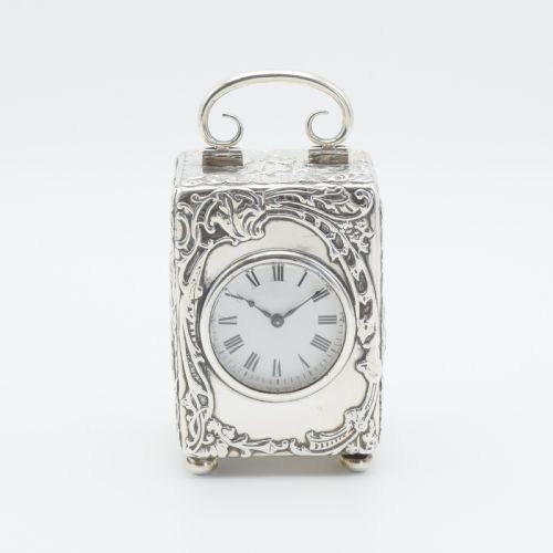 large silver 'repousse' carriage clock timepiece - CATEGORY: ANTIQUE CLOCKS - DATED EDWARDIAN