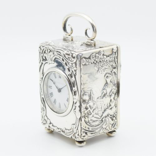 LARGE SILVER 'REPOUSSE' CARRIAGE CLOCK TIMEPIECE - ADDITIONAL PHOTO 1