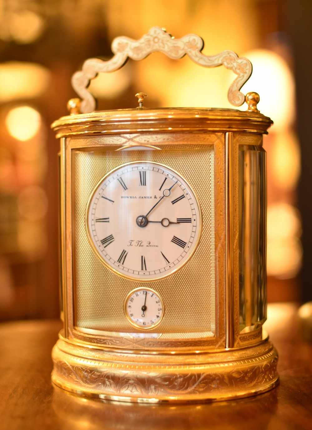 Fine Carriage clock by Howell & James , To the Queen .