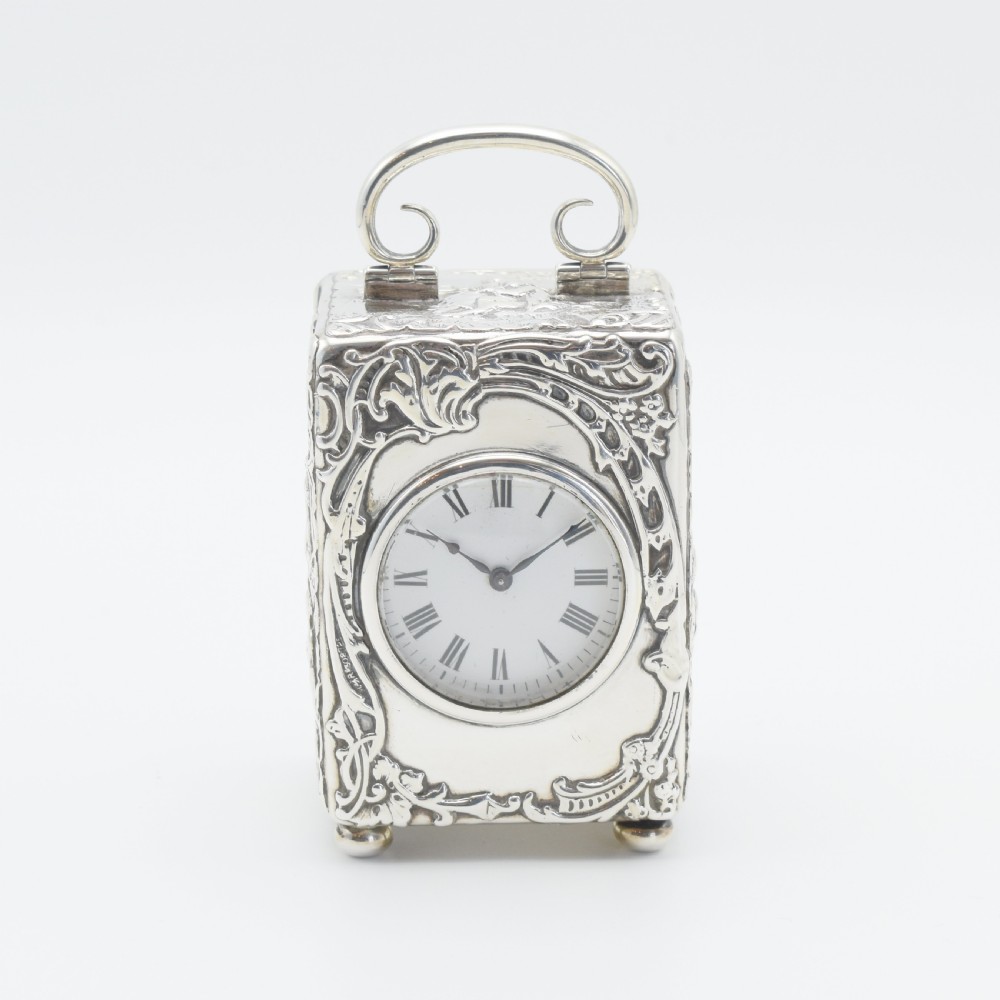 Large Silver 'Repousse' Carriage clock - timepiece