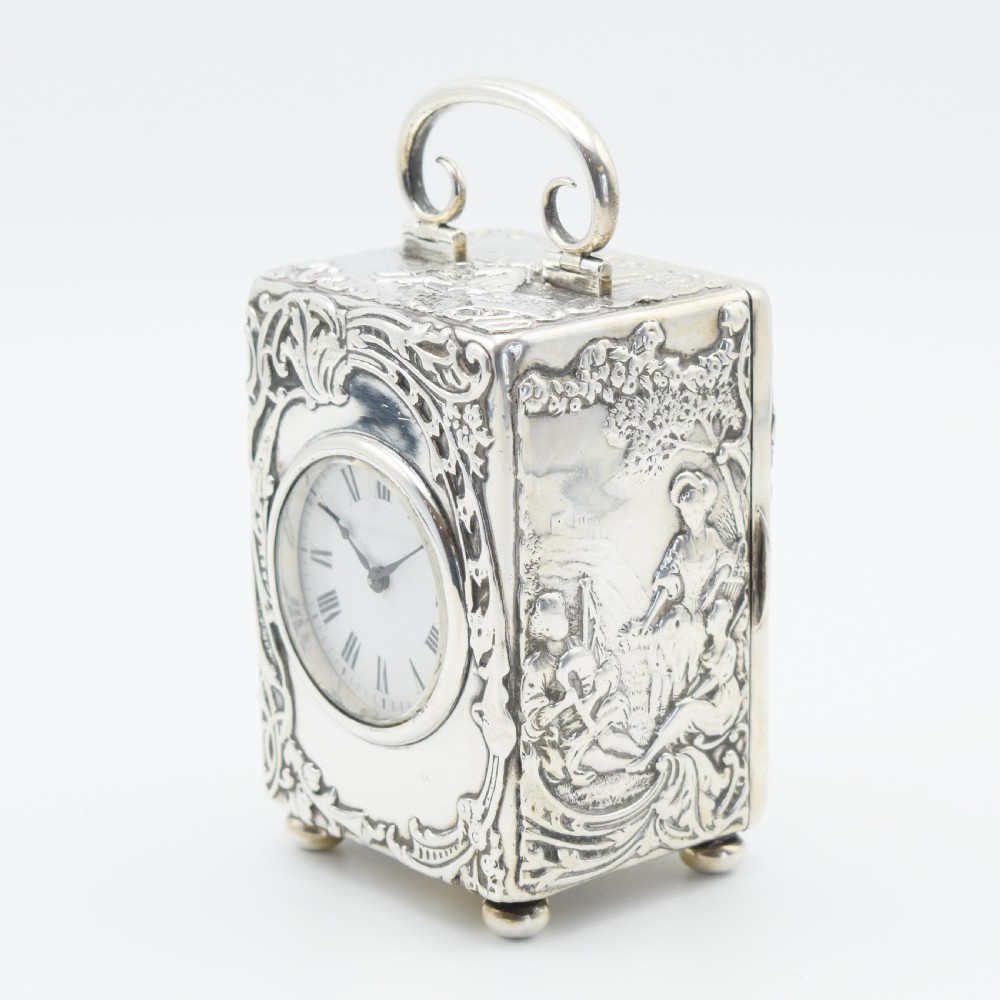 Large Silver 'Repousse' Carriage clock - timepiece View II