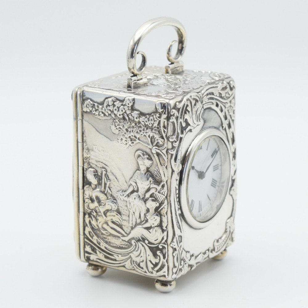 Large Silver 'Repousse' Carriage clock - timepiece View III