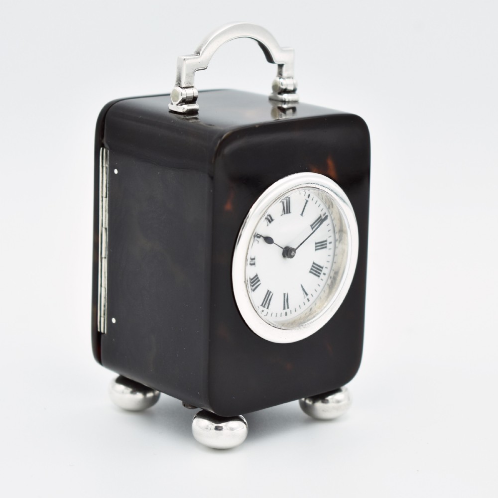 Small timepiece 'Tortioseshell style' Carriage clock. View II