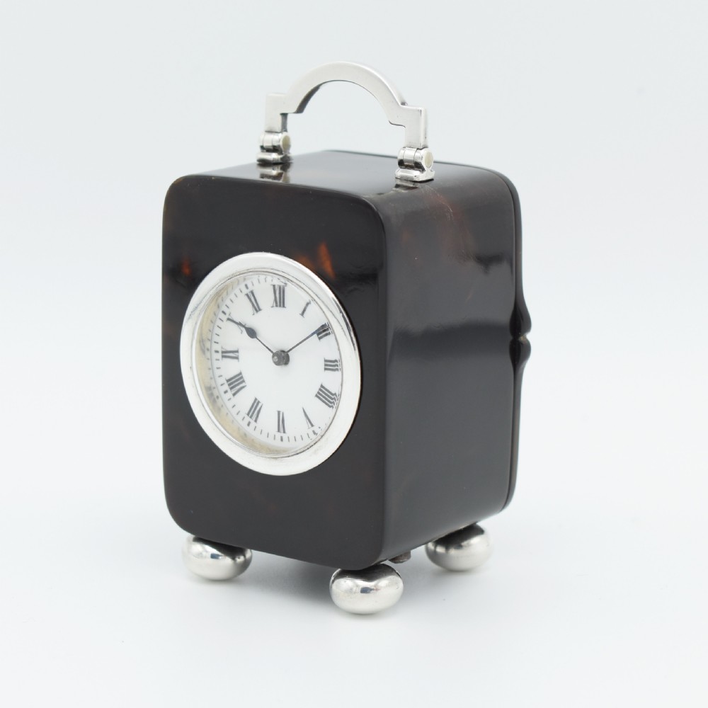 Small timepiece 'Tortioseshell style' Carriage clock. View III