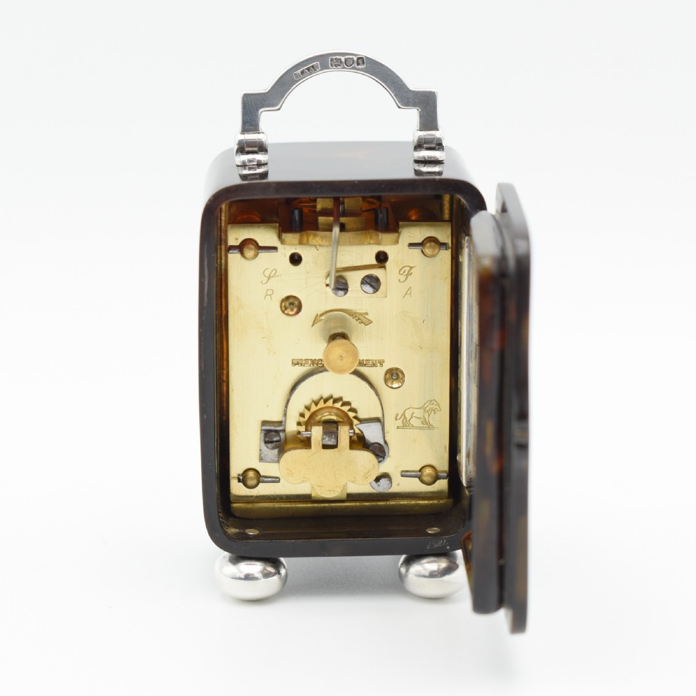 Small timepiece 'Tortioseshell style' Carriage clock. View V