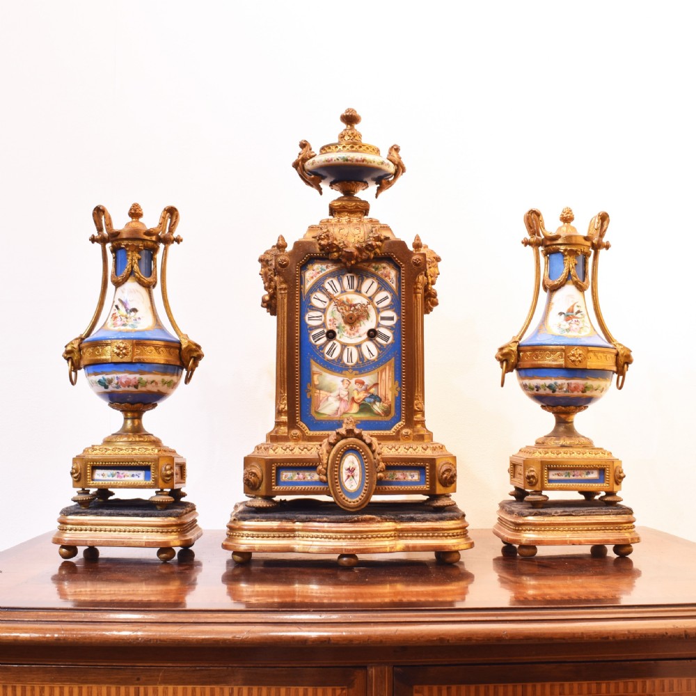 Decorative French clock with Sevres panels and Garnitures 