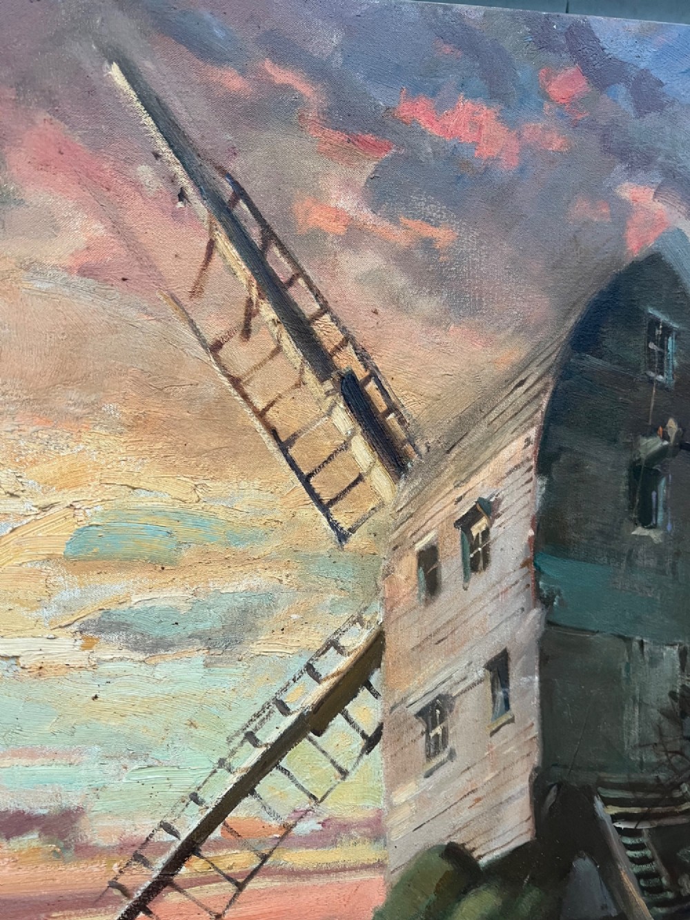 An oil painting depicting a wooden windmill at sunset with a figure walking alongside a dog in a rural landscape. View V