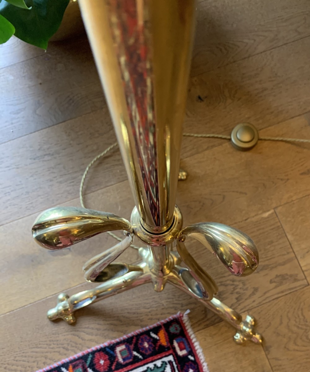 An Edwardian brass telescopic uplighter floor lamp featuring a tripod base, central column, and a wide white opaline glass shade. View II