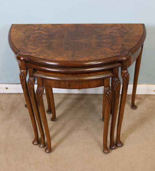 Nest of Three Shaped Figured Burr Walnut Tables.