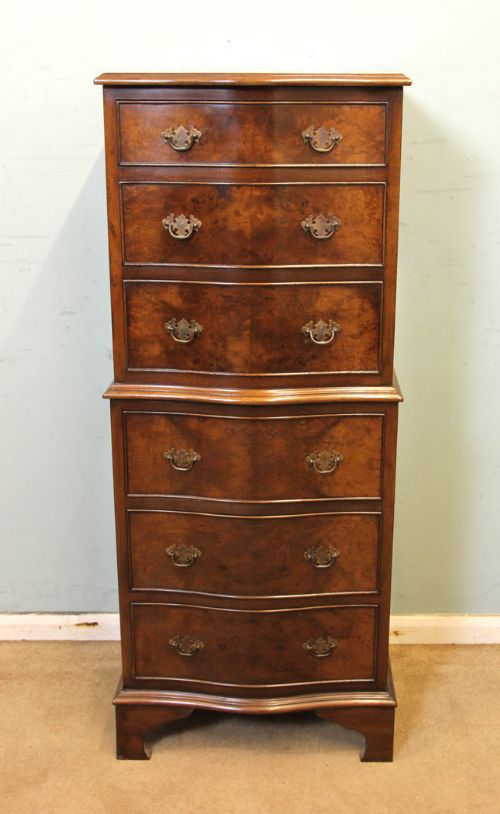 Slim Serpentine Front Burr Walnut Chest on Chest.