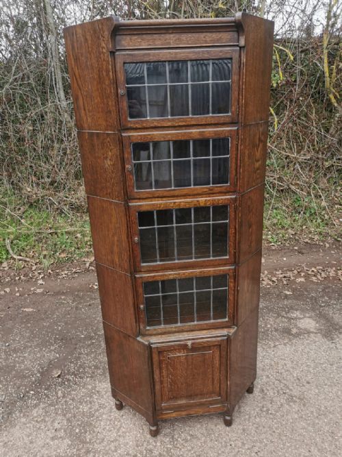unusual minty of oxford corner bookcase - CATEGORY: ANTIQUE BOOKCASES - DATED 1920