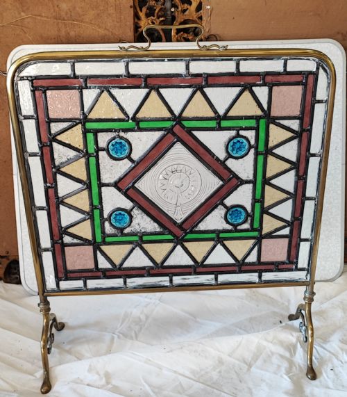 a victorian brass framed stained glass firescreen - CATEGORY: ANTIQUE FIREPLACES - DATED VICTORIAN