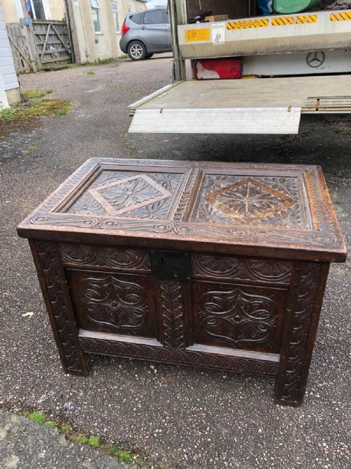 17C CARVED OAK COFFER - ADDITIONAL PHOTO 1