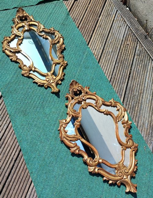 an antique pair of carved italian giltwood mirrors - CATEGORY: ANTIQUE MIRRORS - DATED 1920