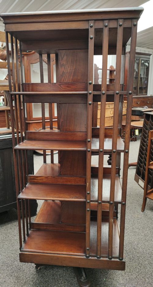 an unusual oversized oak revolving bookcase - CATEGORY: ANTIQUE BOOKCASES - DATED 1900
