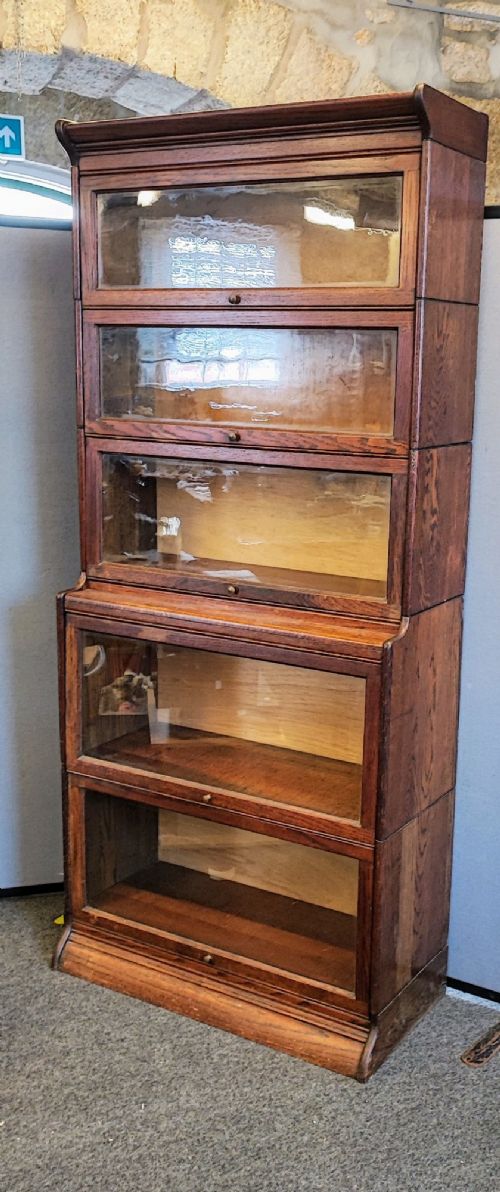 A FIVE TIER SECTIONAL SOLICITORS BOOK CASE IN OAK - ADDITIONAL PHOTO 4