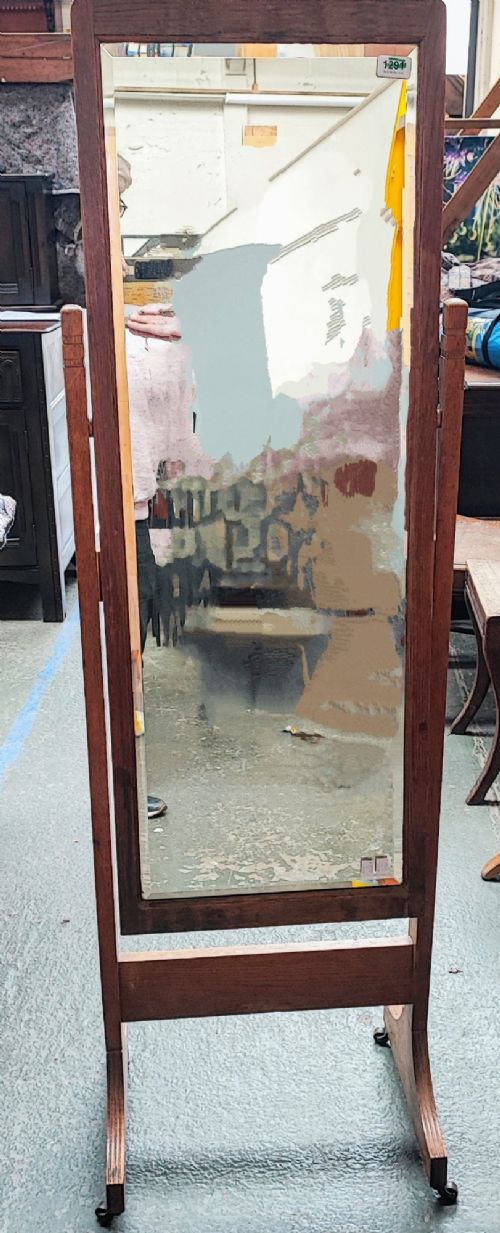 A GOOD OAK ARTS AND CRAFTS CHEVAL MIRROR