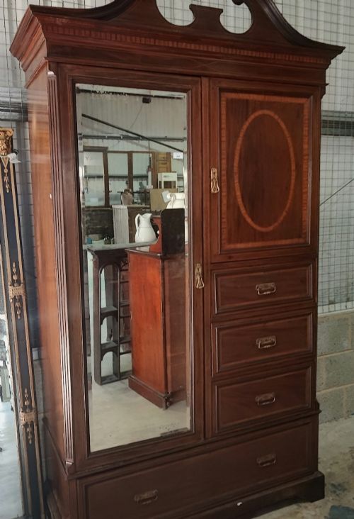 A Victorian Inlaid Compactum Wardrobe by Edwards and Roberts