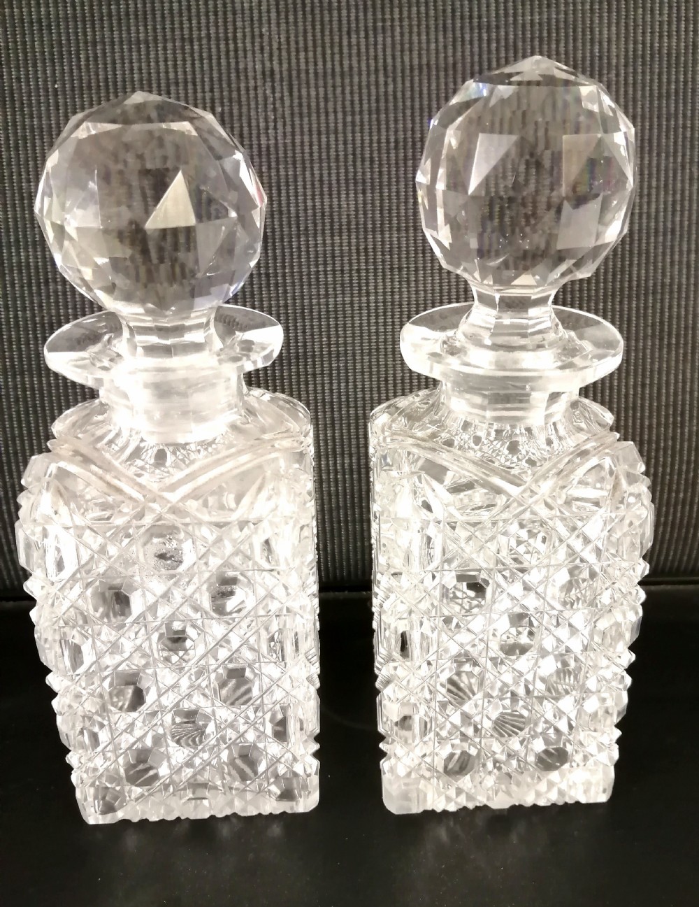 Small pair of square based decanters.