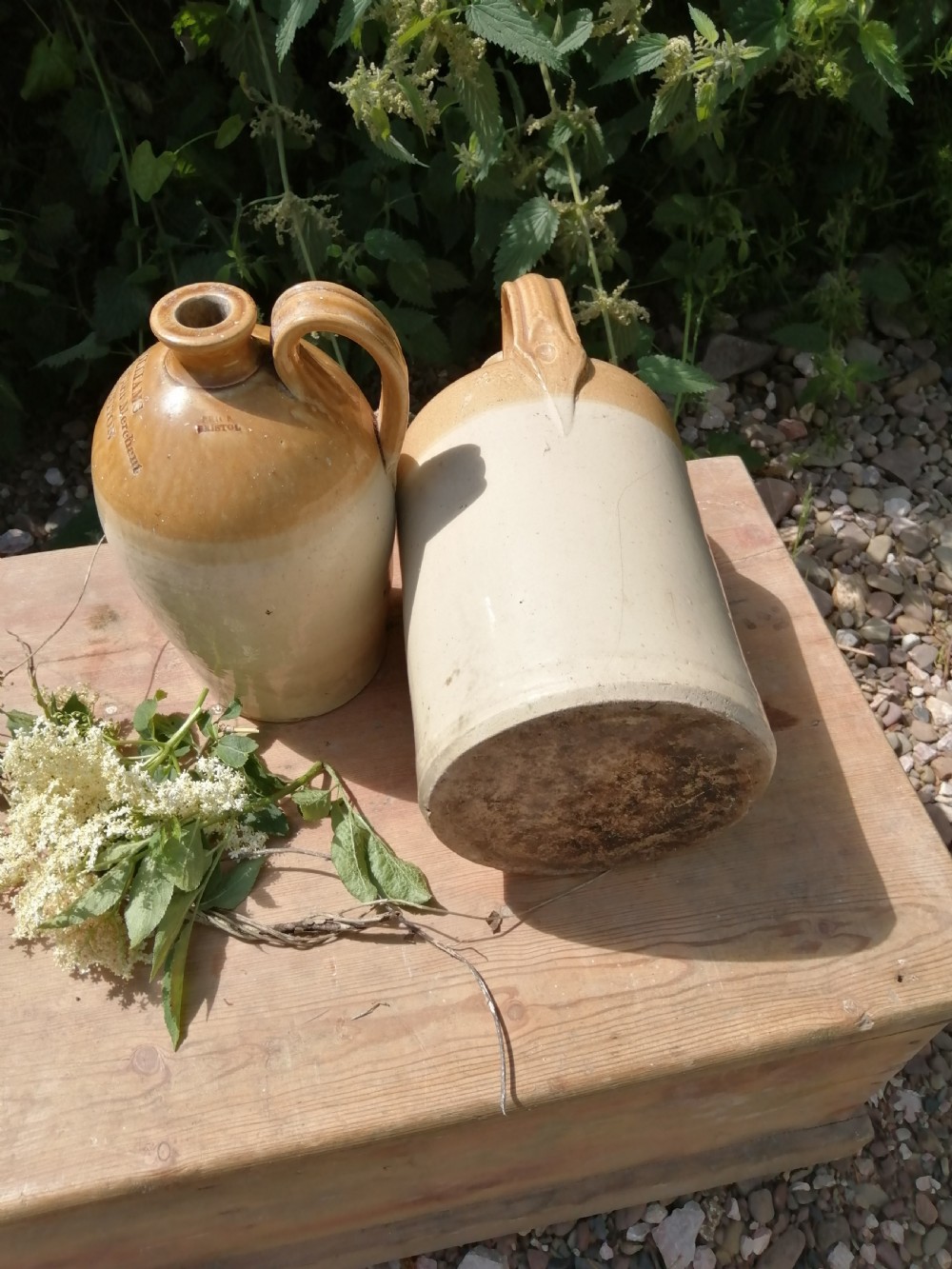 2 Devon stoneware Victorian wine or spirit jugs View III