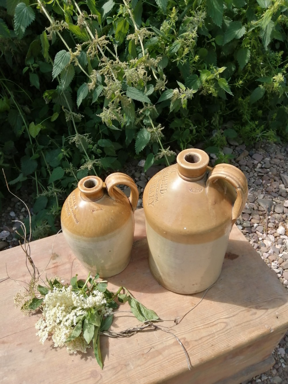 2 Devon stoneware Victorian wine or spirit jugs View VI