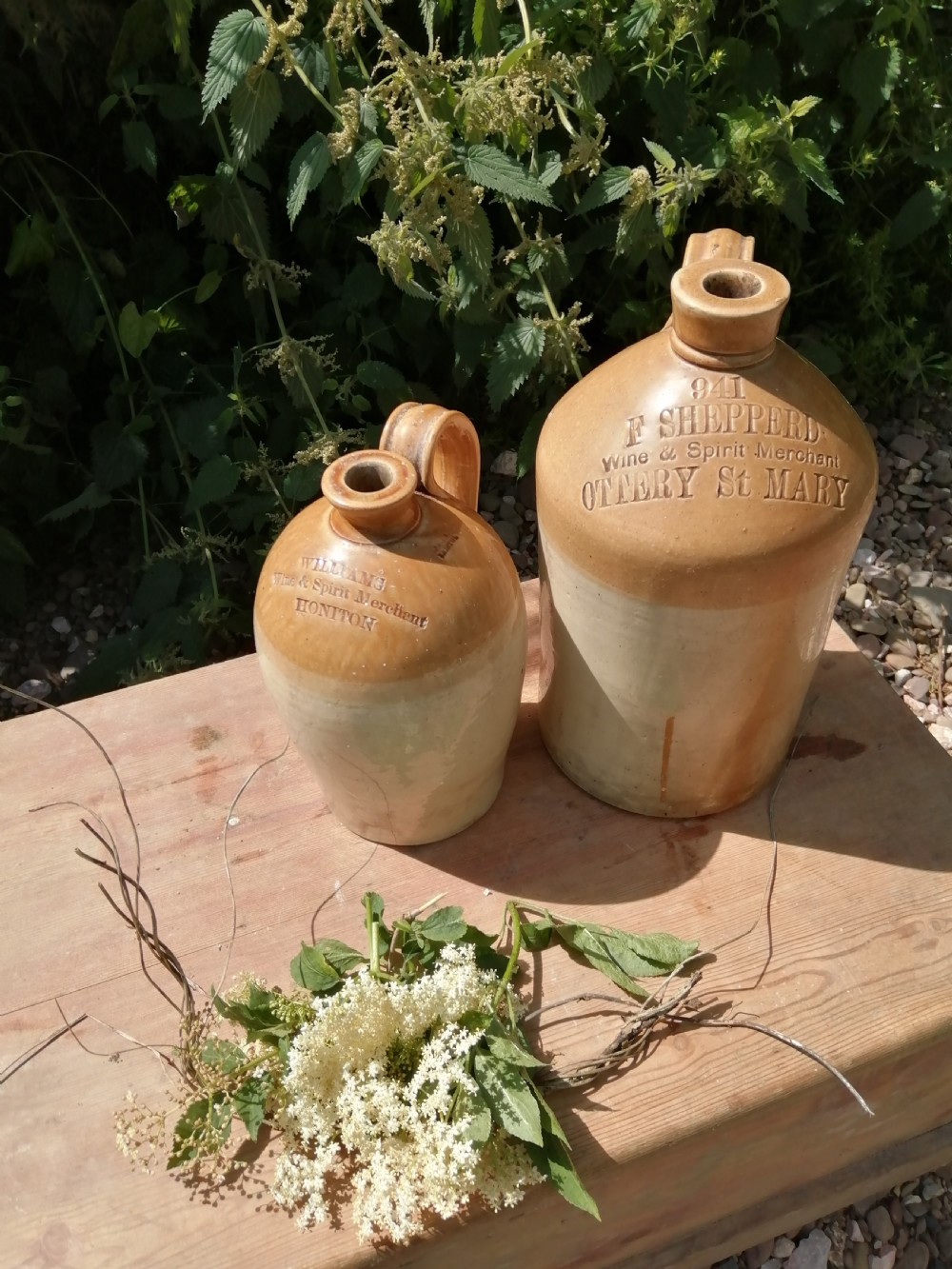 2 Devon stoneware Victorian wine or spirit jugs View IX