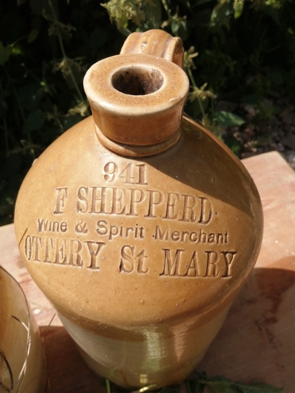 2 Devon stoneware Victorian wine or spirit jugs View X