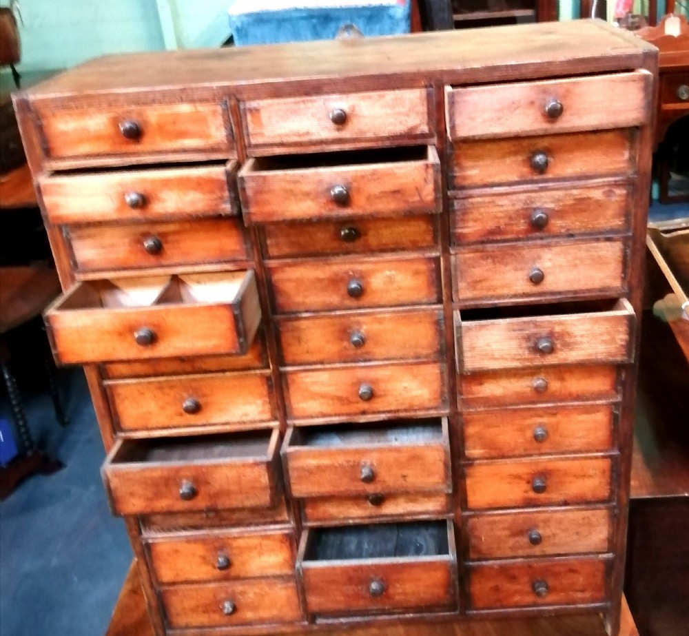Antique collectors chest of drawers. View II