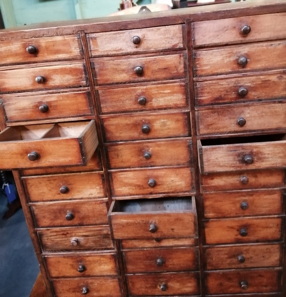 Antique collectors chest of drawers. View III