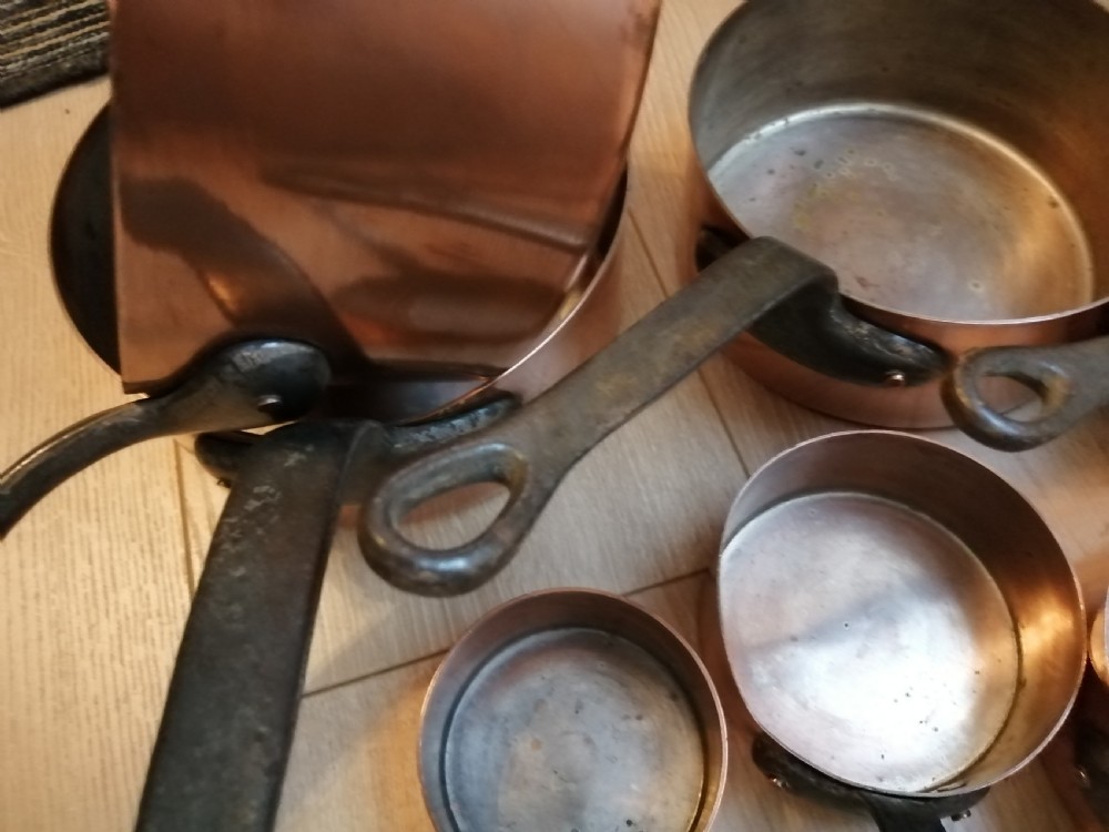 Antique set of 7 copper and steel French cooking pans. View V