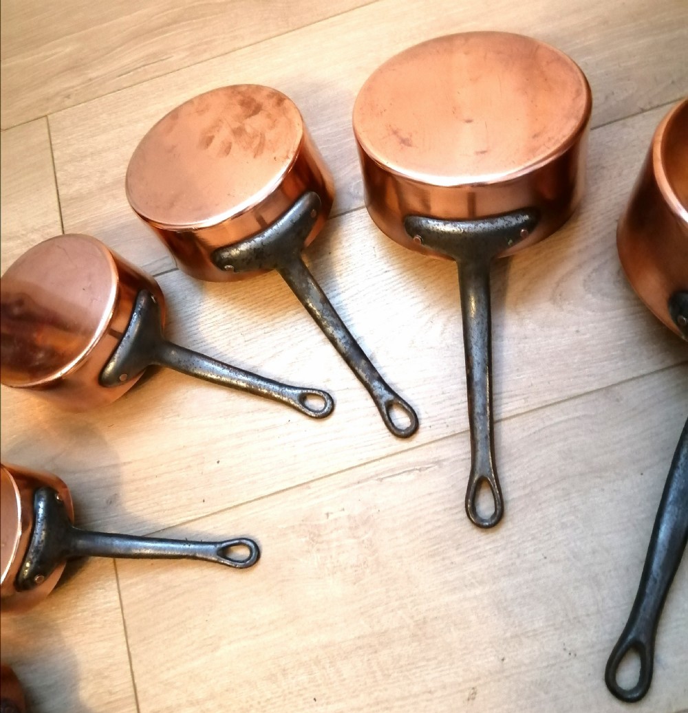 Antique set of 7 copper and steel French cooking pans. View X