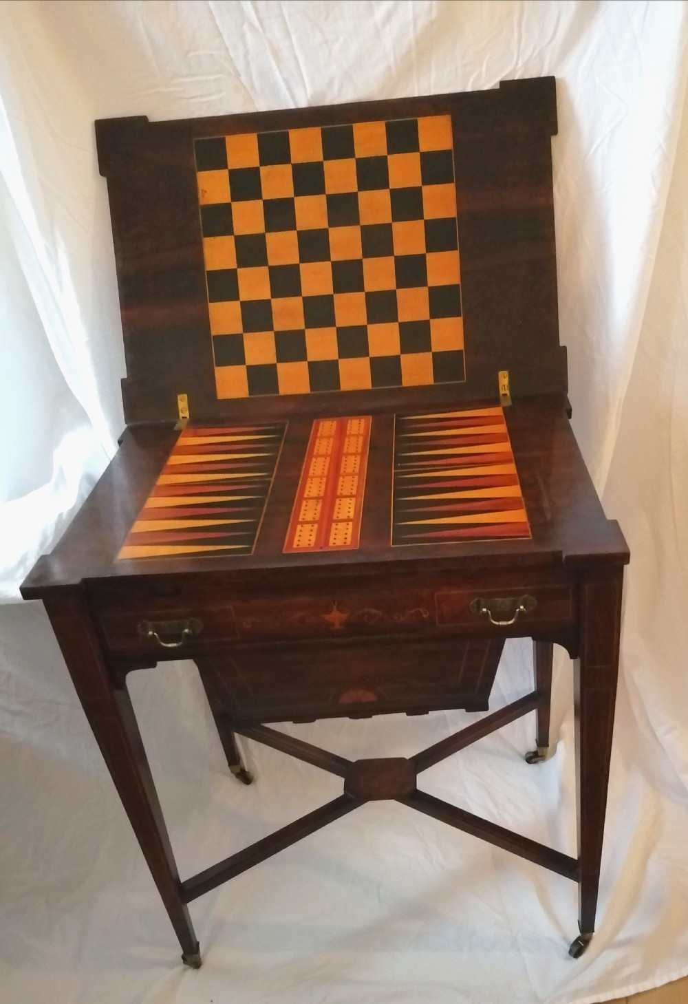 An unusual Edwardian Rosewood inlaid games table and combination work box.