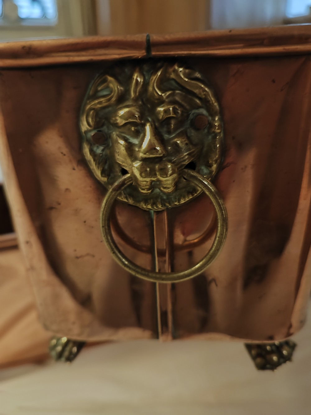 An antique pair of copper and brass planters. View III