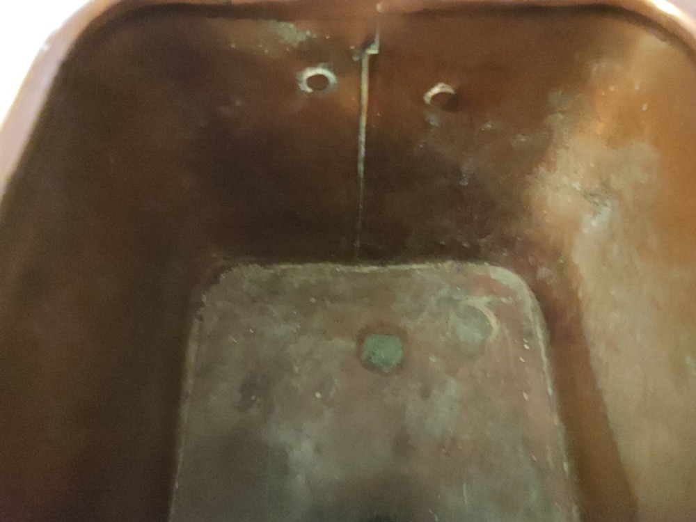 An antique pair of copper and brass planters. View IV