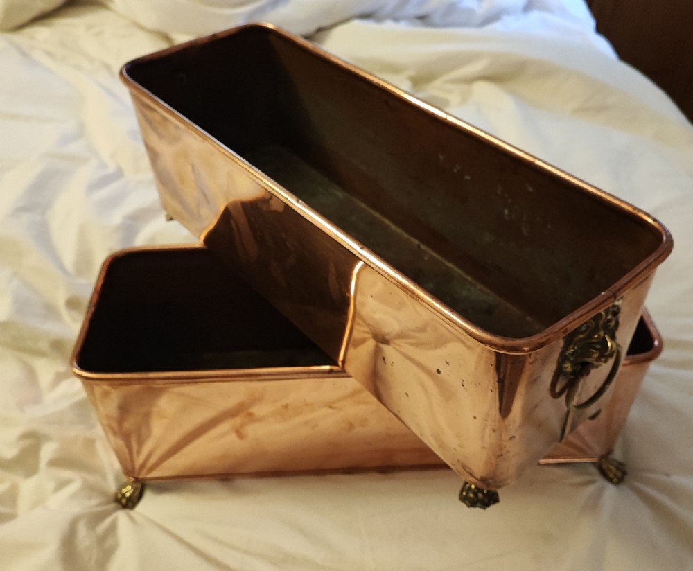 An antique pair of copper and brass planters. View VI