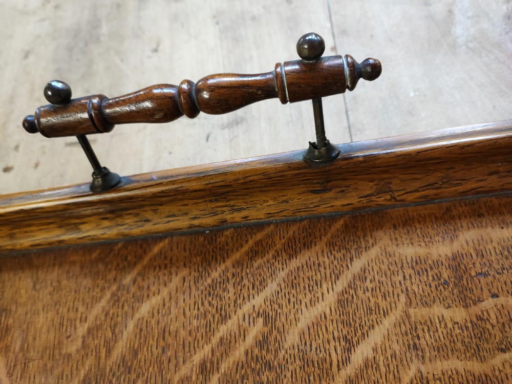 A large Edwardian oak and brass tray. View II