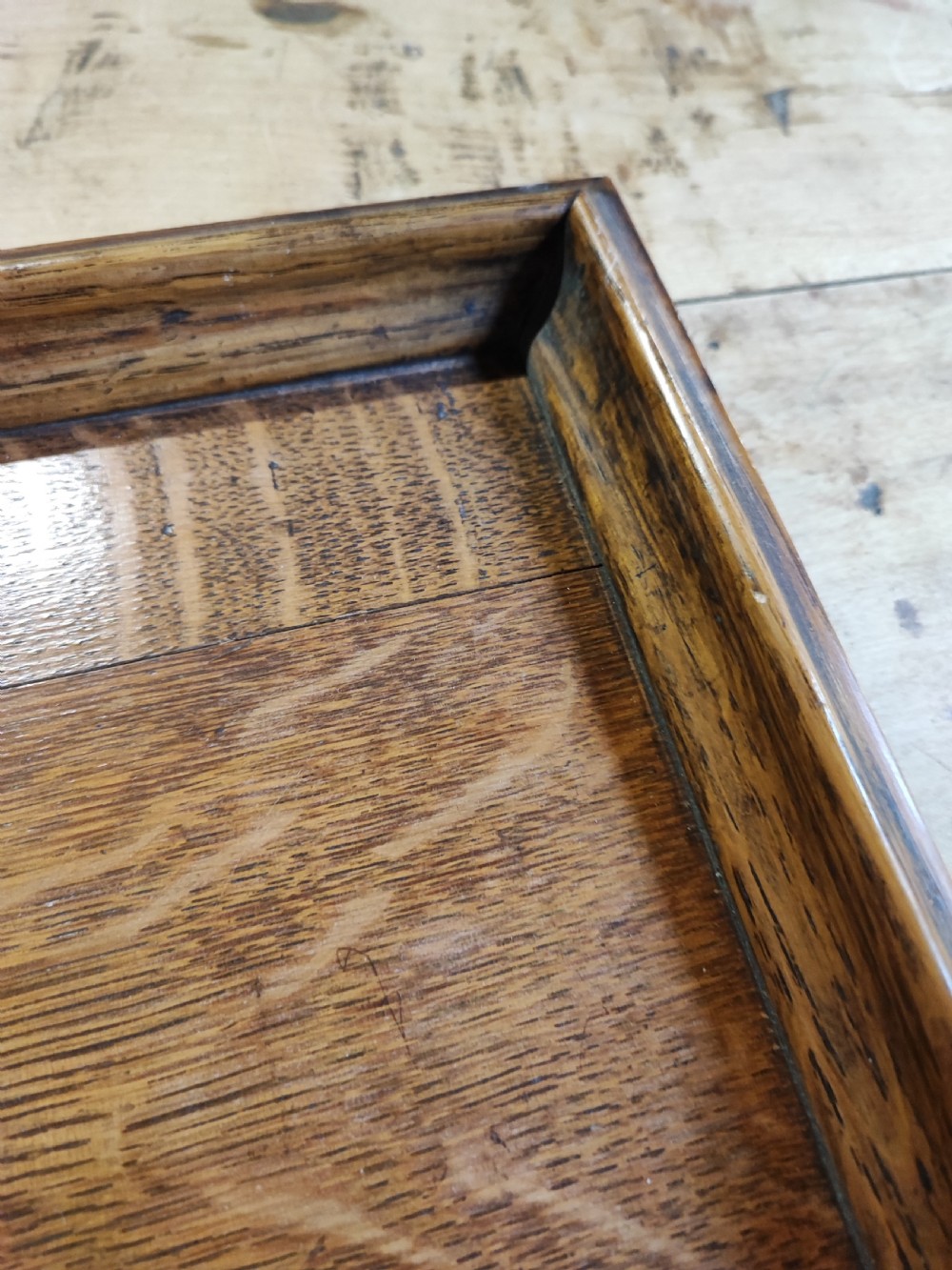A large Edwardian oak and brass tray. View III