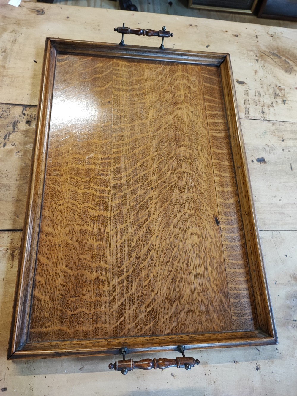A large Edwardian oak and brass tray. View IV